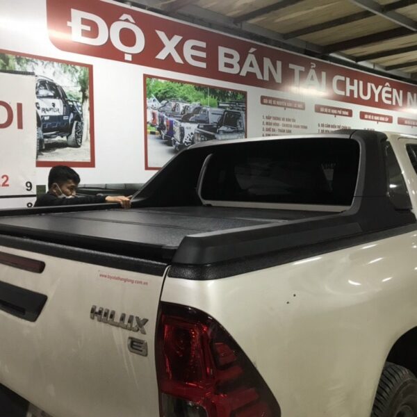 Alternative view of Nắp thùng 3 tấm cho xe Hilux Adventure cao cấp