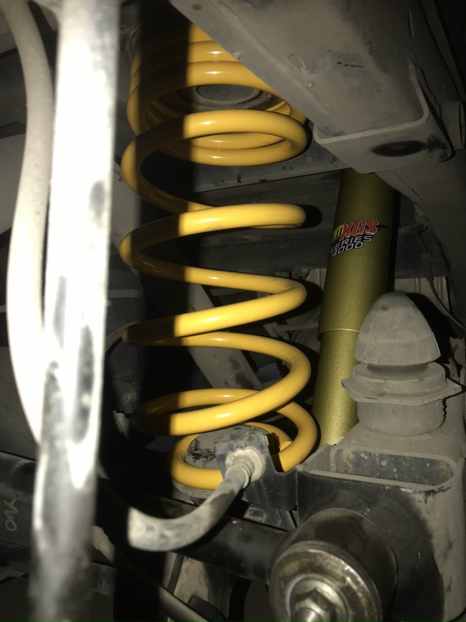 Phuộc êm TJM XGS 4000 ÚC lắp xe Nissan Navara EL - Ảnh 4