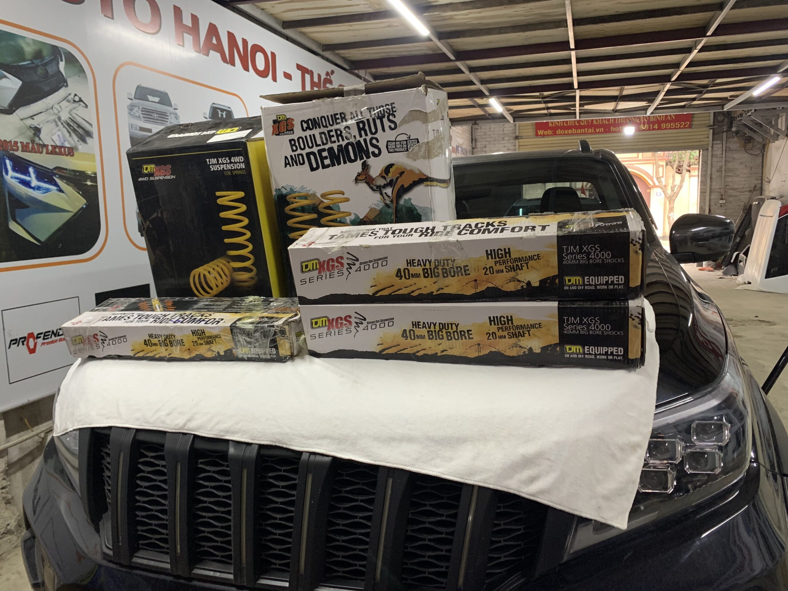 Phuộc êm TJM XGS 4000 ÚC lắp xe Nissan Navara EL - Ảnh 10